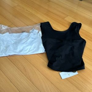 Spiritual gangster, 2 twisted open back tanks 1 white 1 black both size large